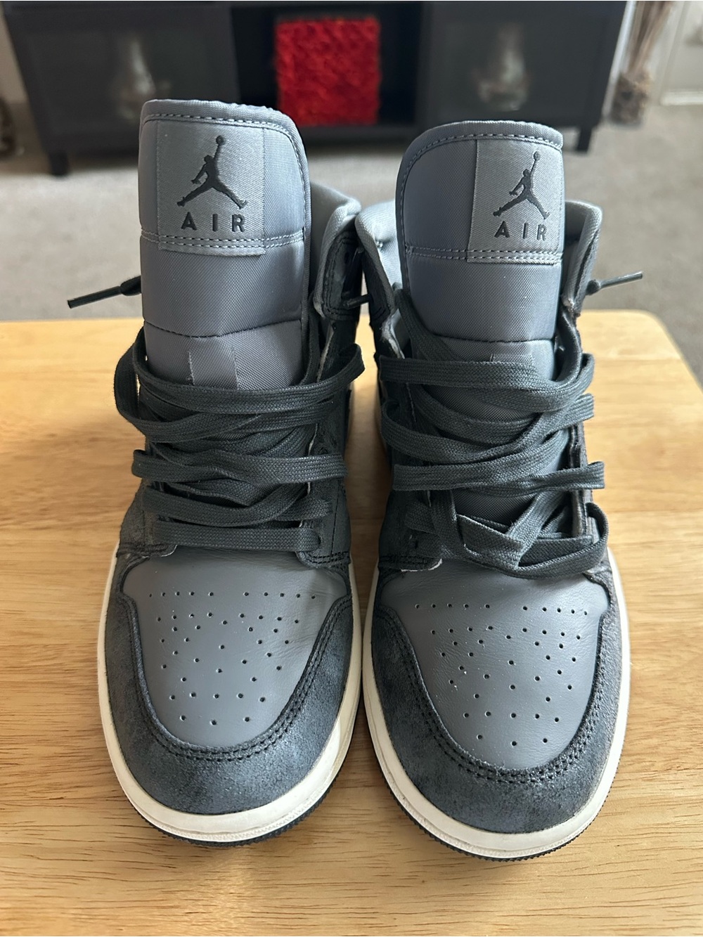 Jordan Woman’s (Mid height) Sneakers in Gray and Dark Gray.